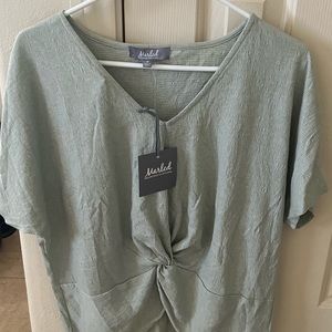 NWT women’s top size M